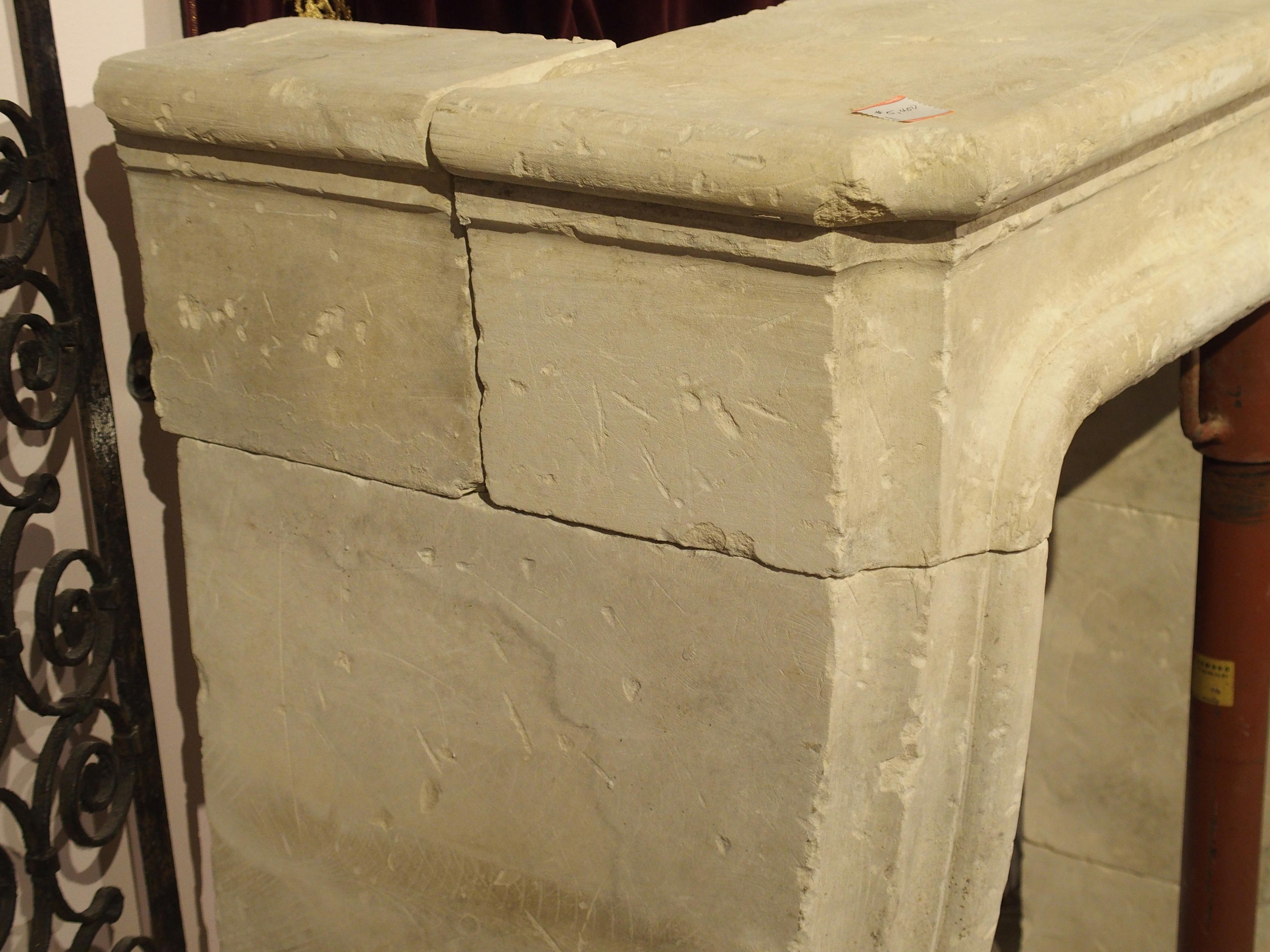 Louis XIV Carved and Distressed Italian Limestone Fireplace Mantel