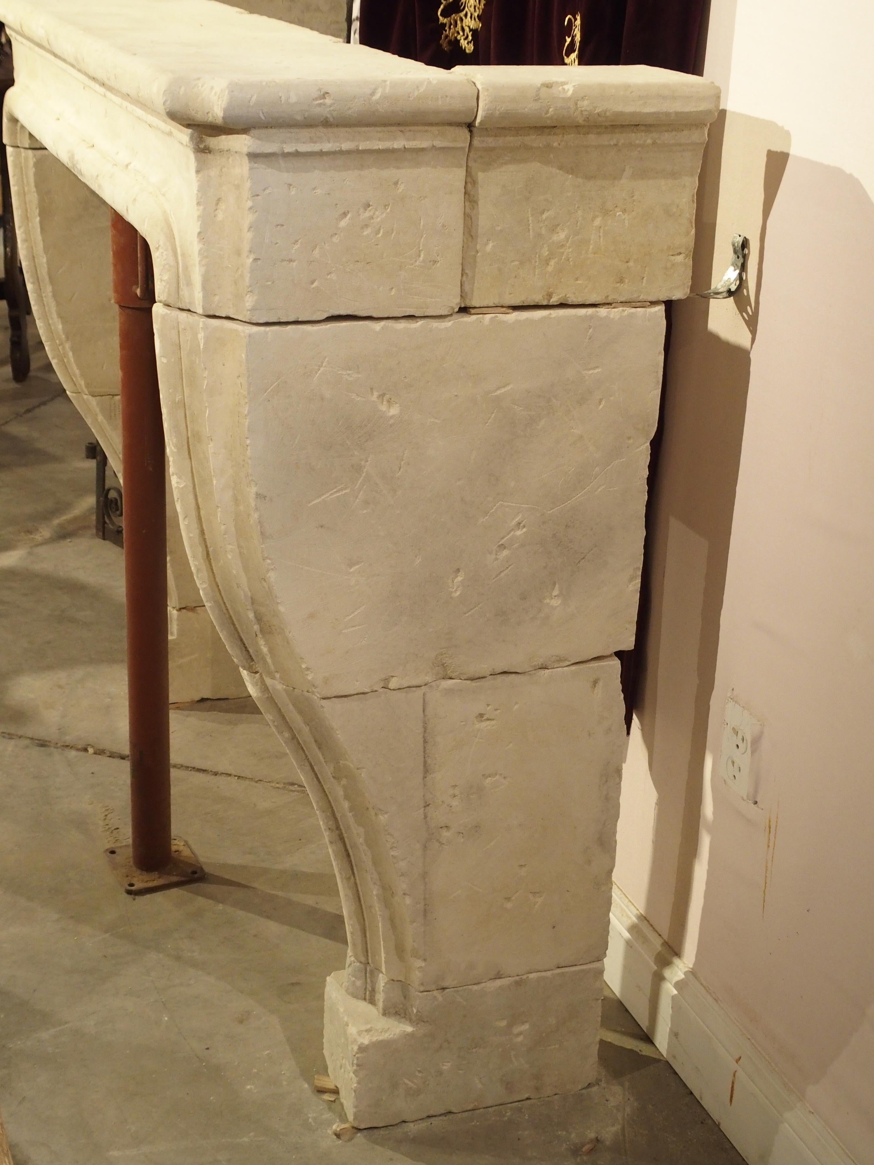 Contemporary Carved and Distressed Italian Limestone Fireplace Mantel