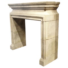 Carved and Distressed Italian Limestone Fireplace Mantel