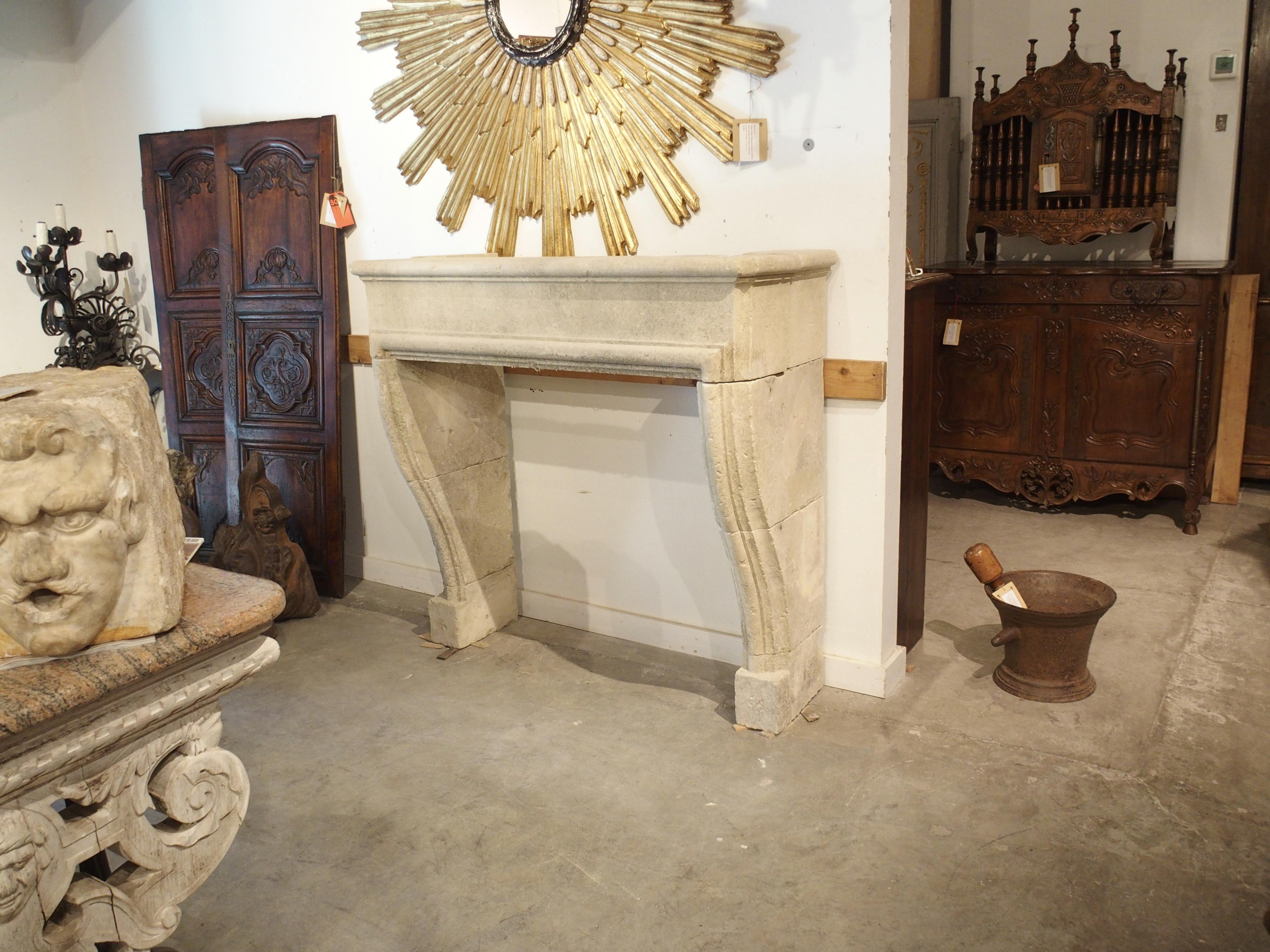 Italian Carved and Distressed Limestone Fireplace Mantel from Southern Italy