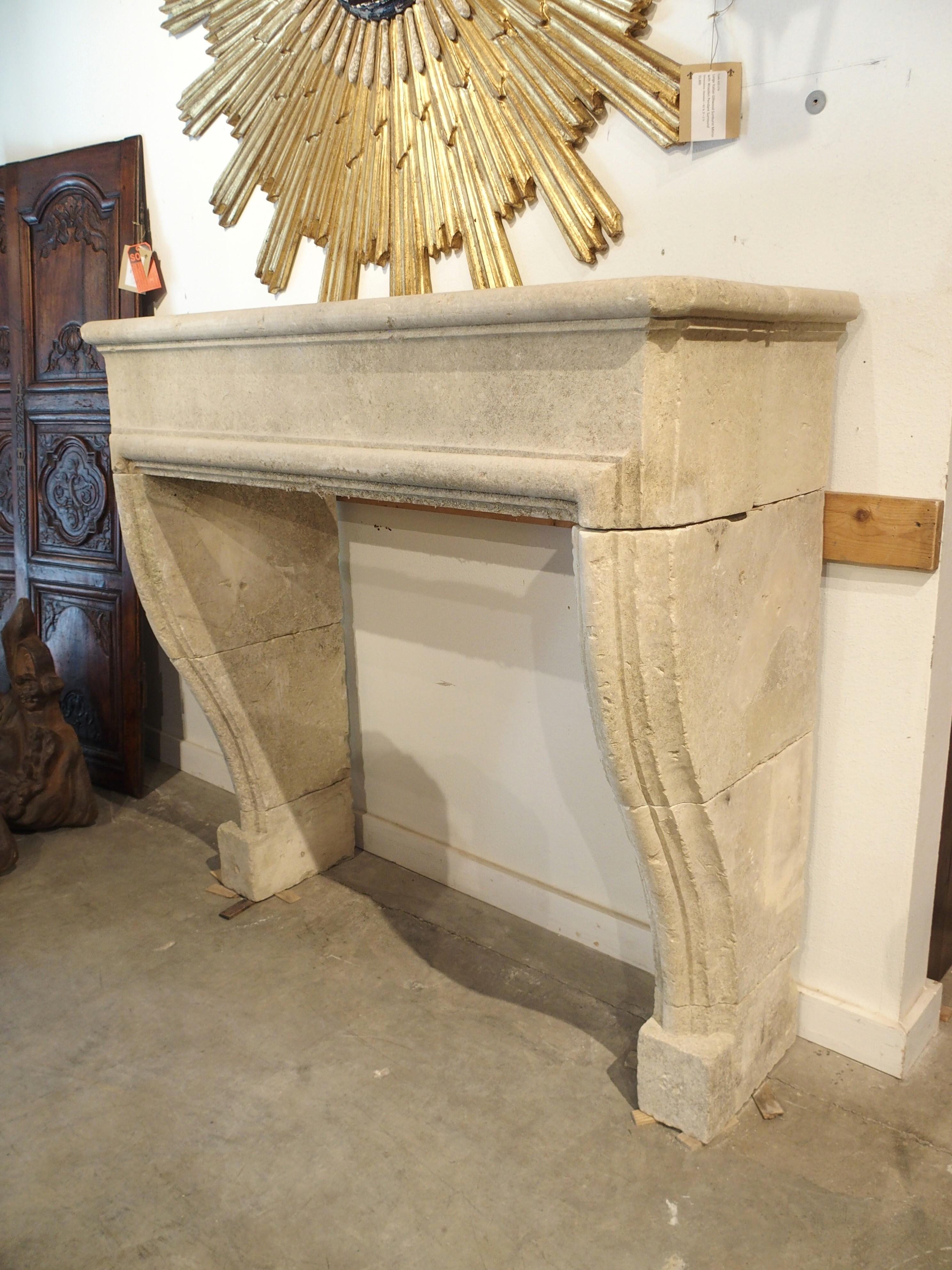 Hand-Carved Carved and Distressed Limestone Fireplace Mantel from Southern Italy