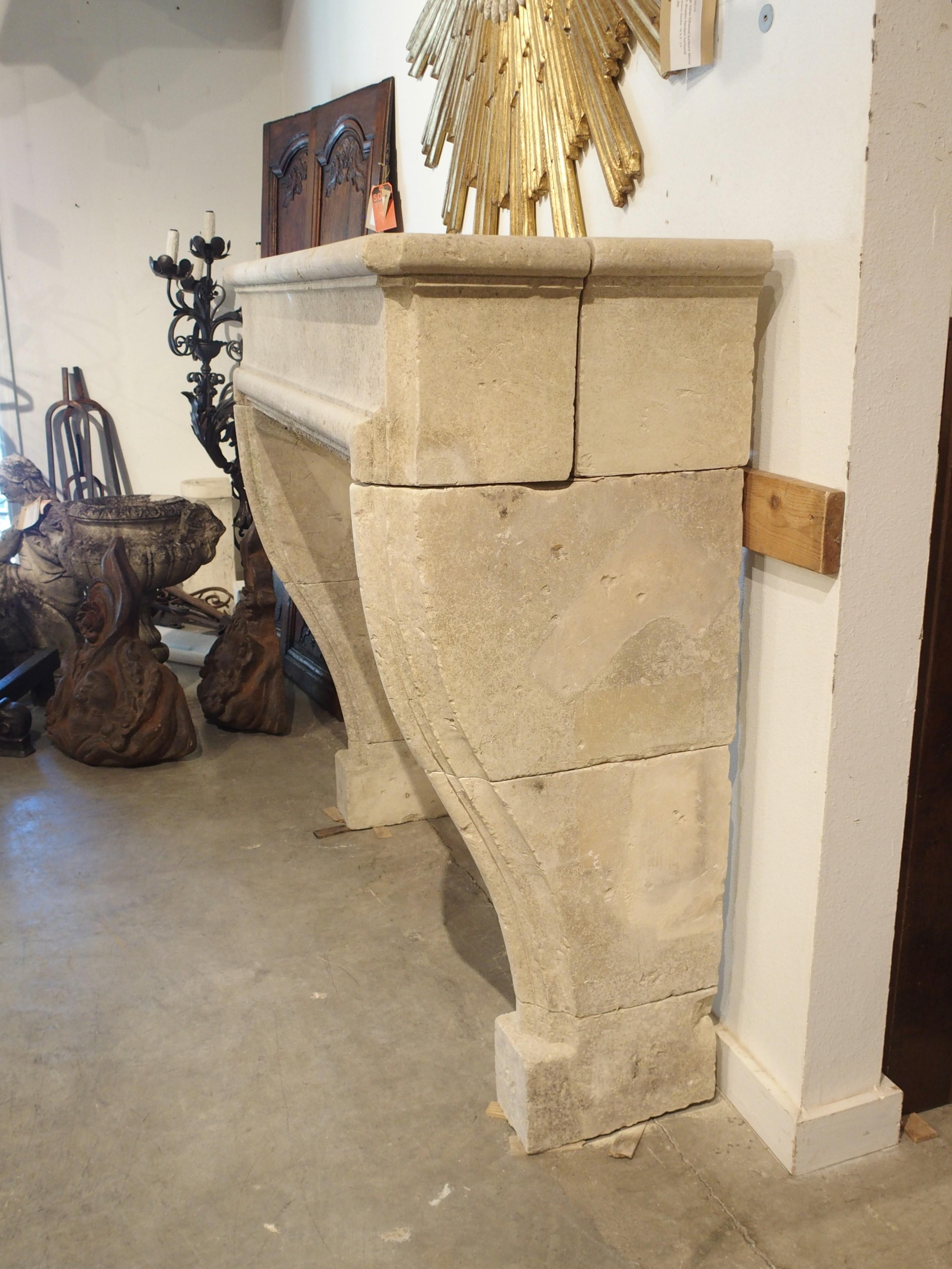 Carved and Distressed Limestone Fireplace Mantel from Southern Italy In Good Condition In Dallas, TX