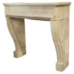 Carved and Distressed Limestone Fireplace Mantel from Southern Italy