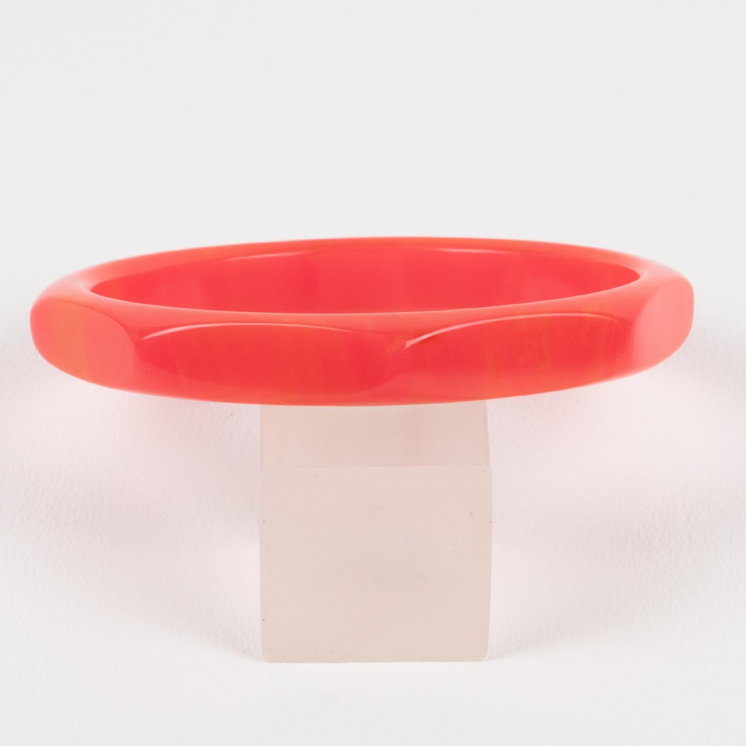 Art Deco Carved and Faceted Bakelite Bracelet Bangle Pink Tequila Marble For Sale