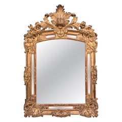 Carved and Gilded Baroque Mirror with Floral Crest, 18th Century