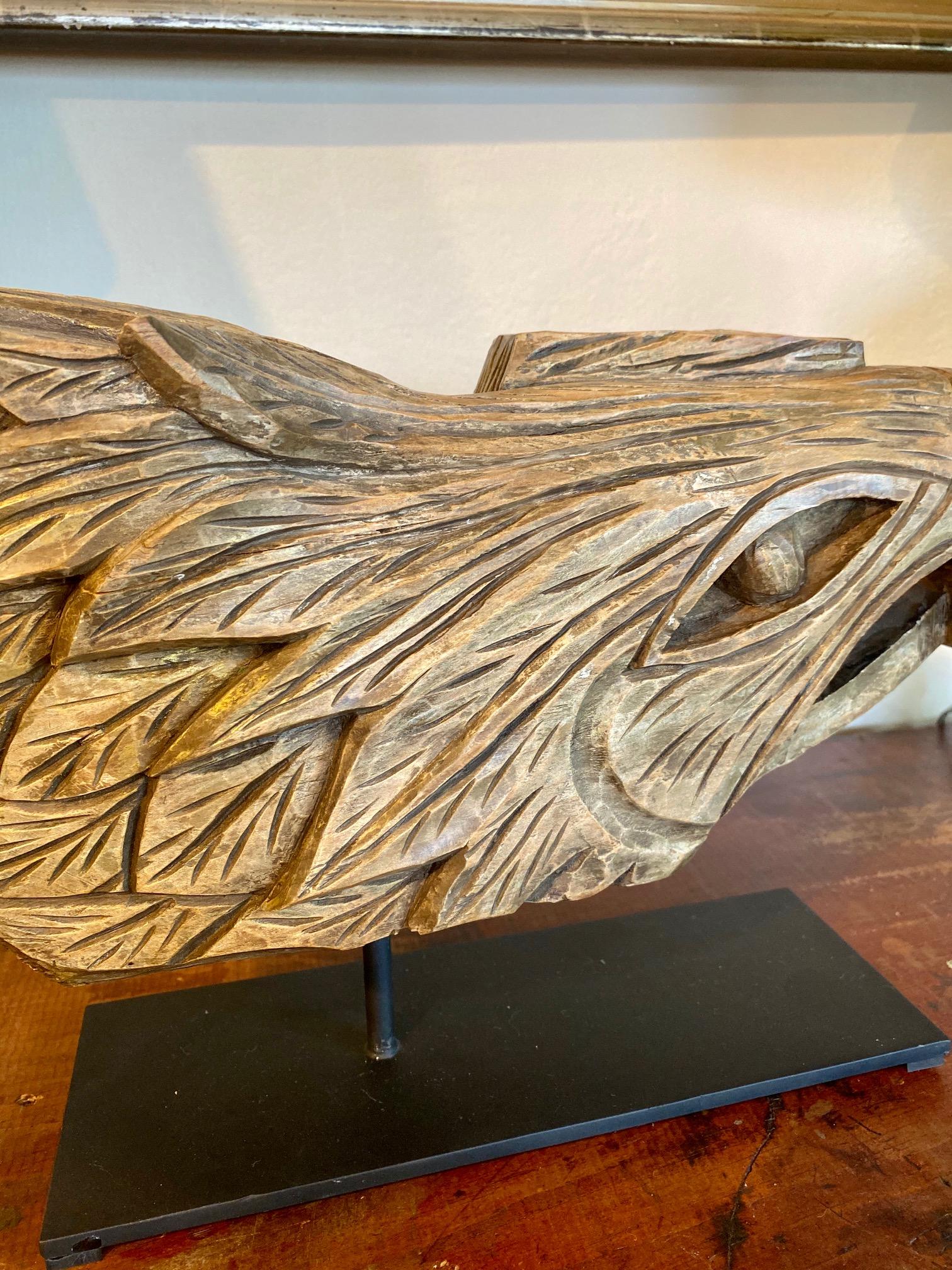 Carved and gilded eagle figurehead from the workshop of John Bellamy in Portsmouth, NH, circa 1890, an unfinished work in that it was never mounted on a ship. John Haley Bellamy was born in Kittery, Maine in 1836 and died next door in Portsmouth, NH