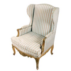 Carved and Gilded French Wing Armchair