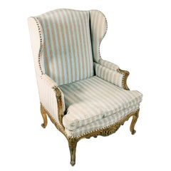 Carved and Gilded French Wing Armchair