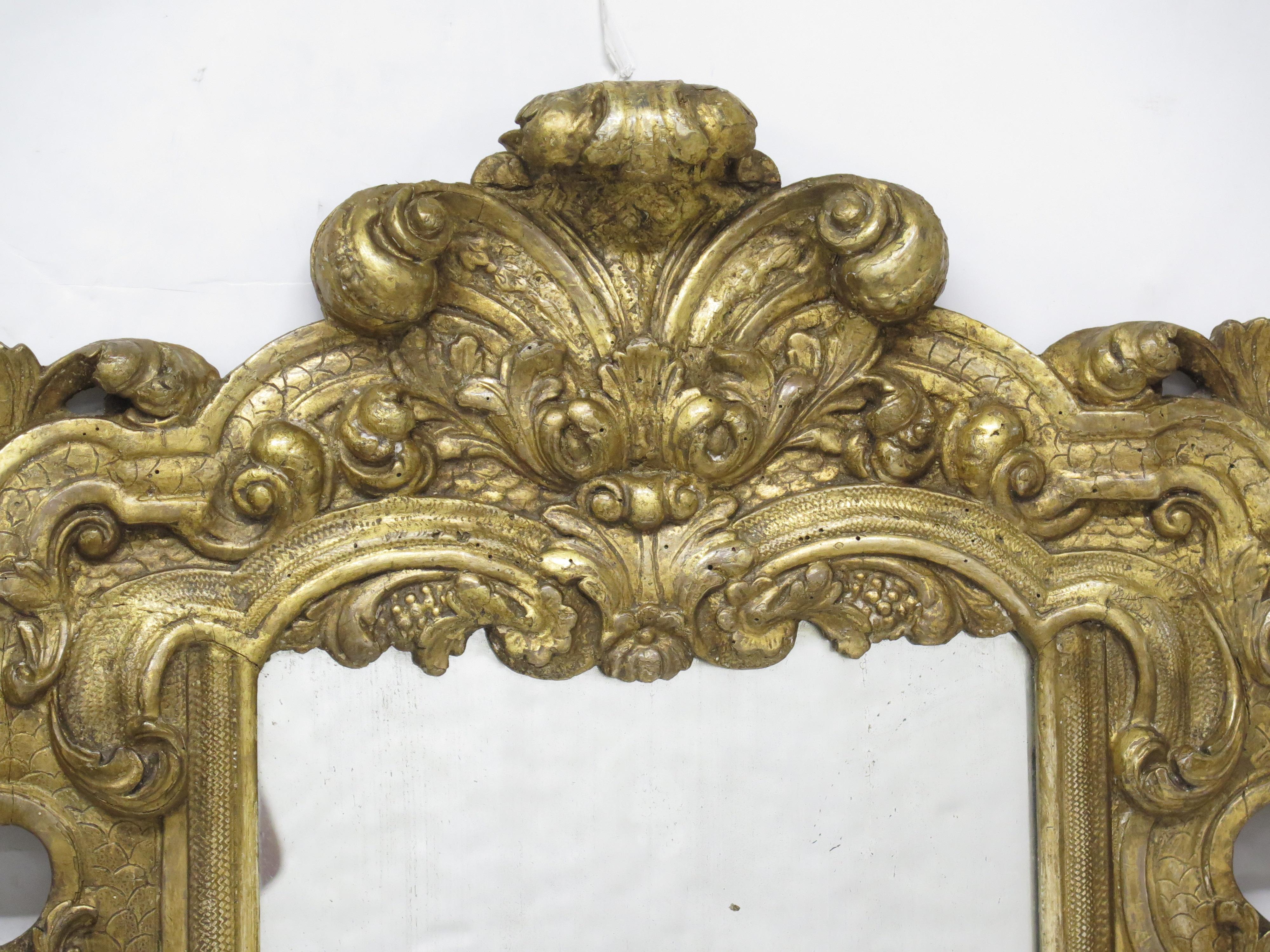 Baroque Carved and Gilded Italian Looking Glass / Mirror For Sale