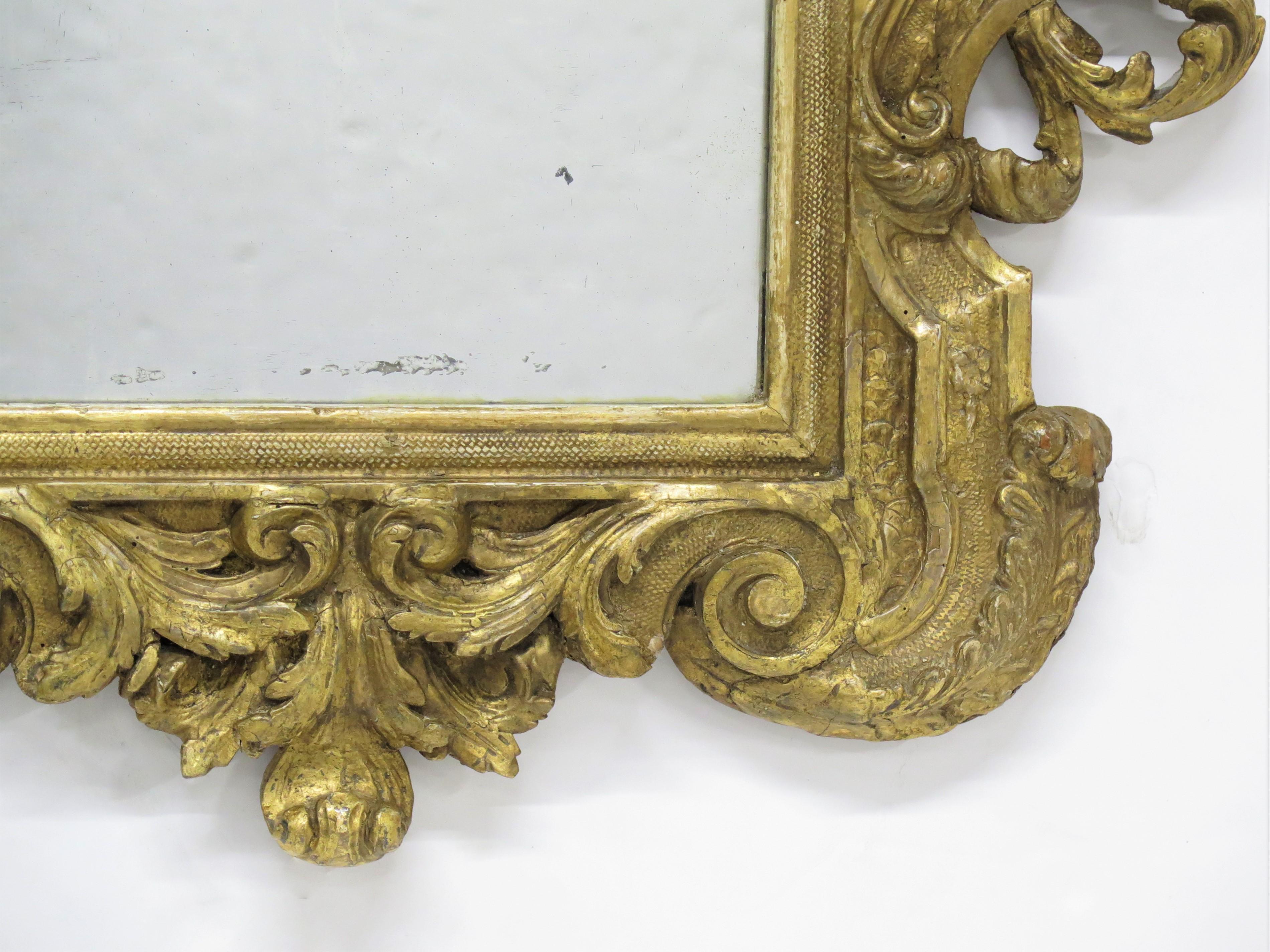 Geschnitztes und vergoldetes italienisches Glas / Spiegel (18. Jahrhundert und früher) im Angebot