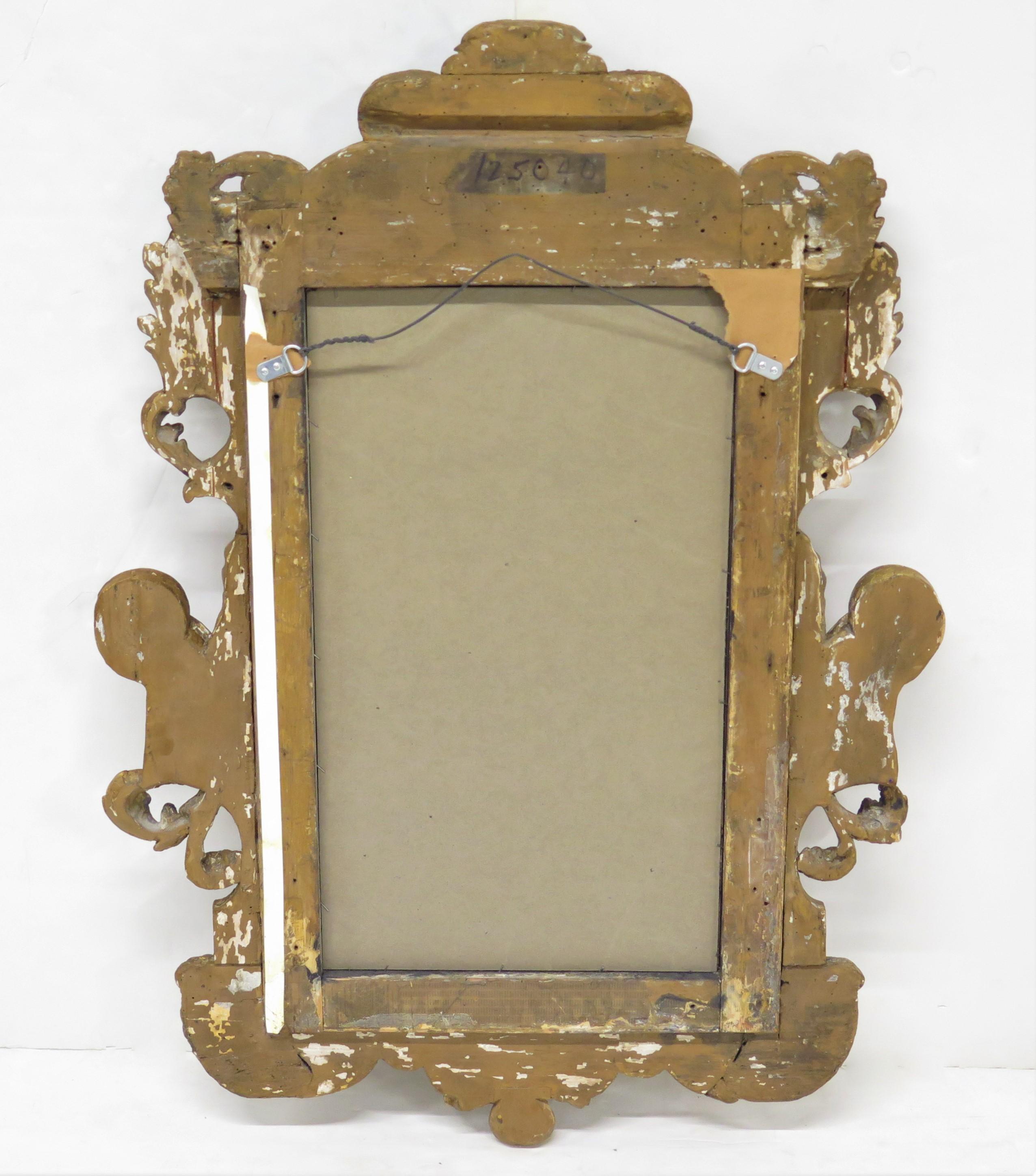 Carved and Gilded Italian Looking Glass / Mirror For Sale 2