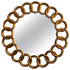 Grand miroir rond sculpté et doré par Harrison & Gil