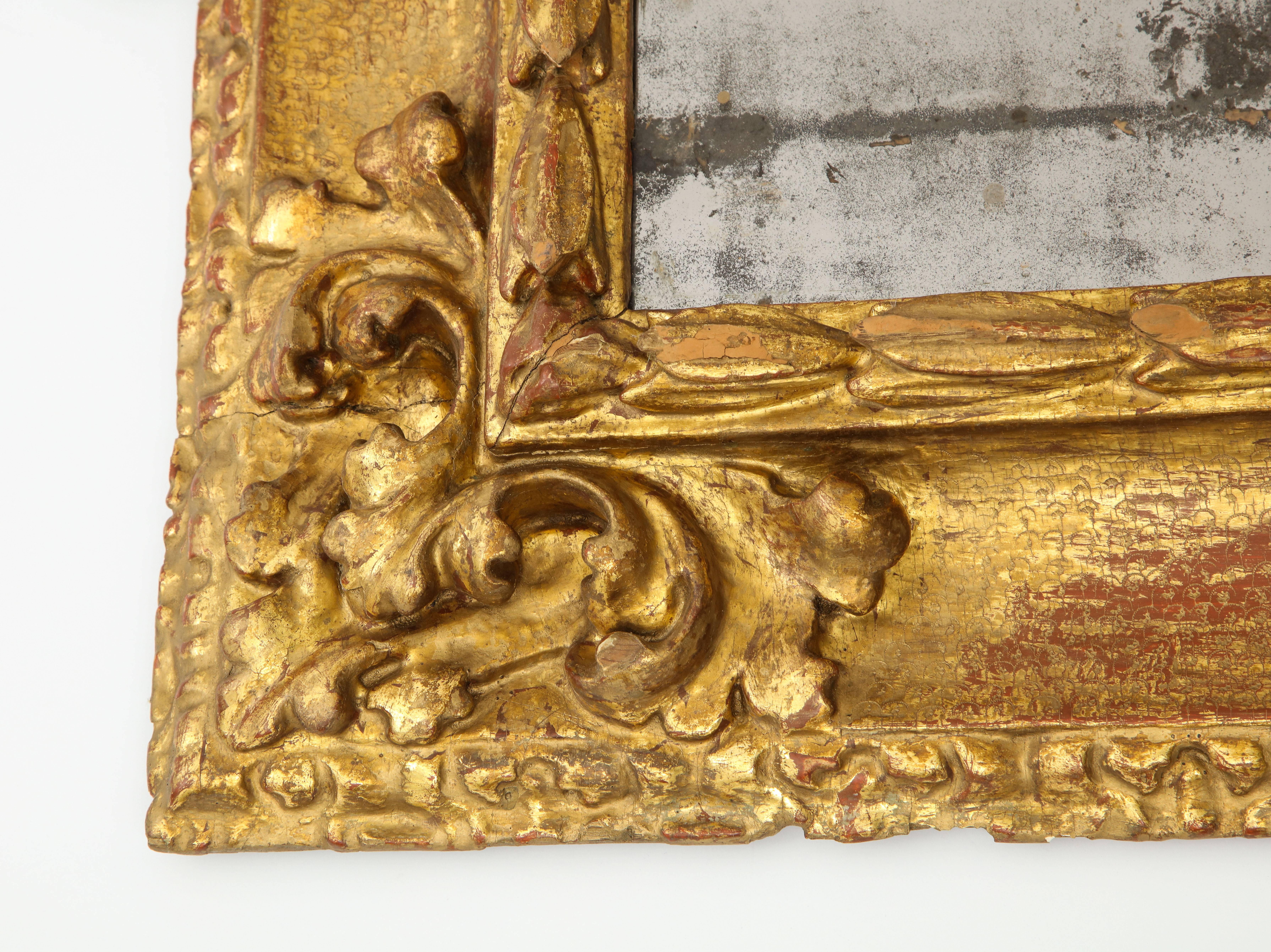 Carved and Gilded Reverse Profile Spanish Baroque Mirror Frame In Excellent Condition For Sale In New York, NY