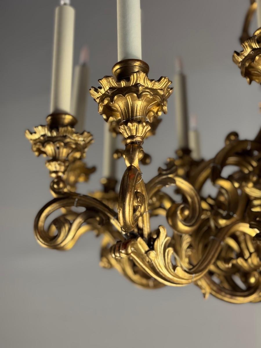Luigi XV Lampadario in legno intagliato e dorato, 18 bracci luminosi, Italia 1880 circa in vendita