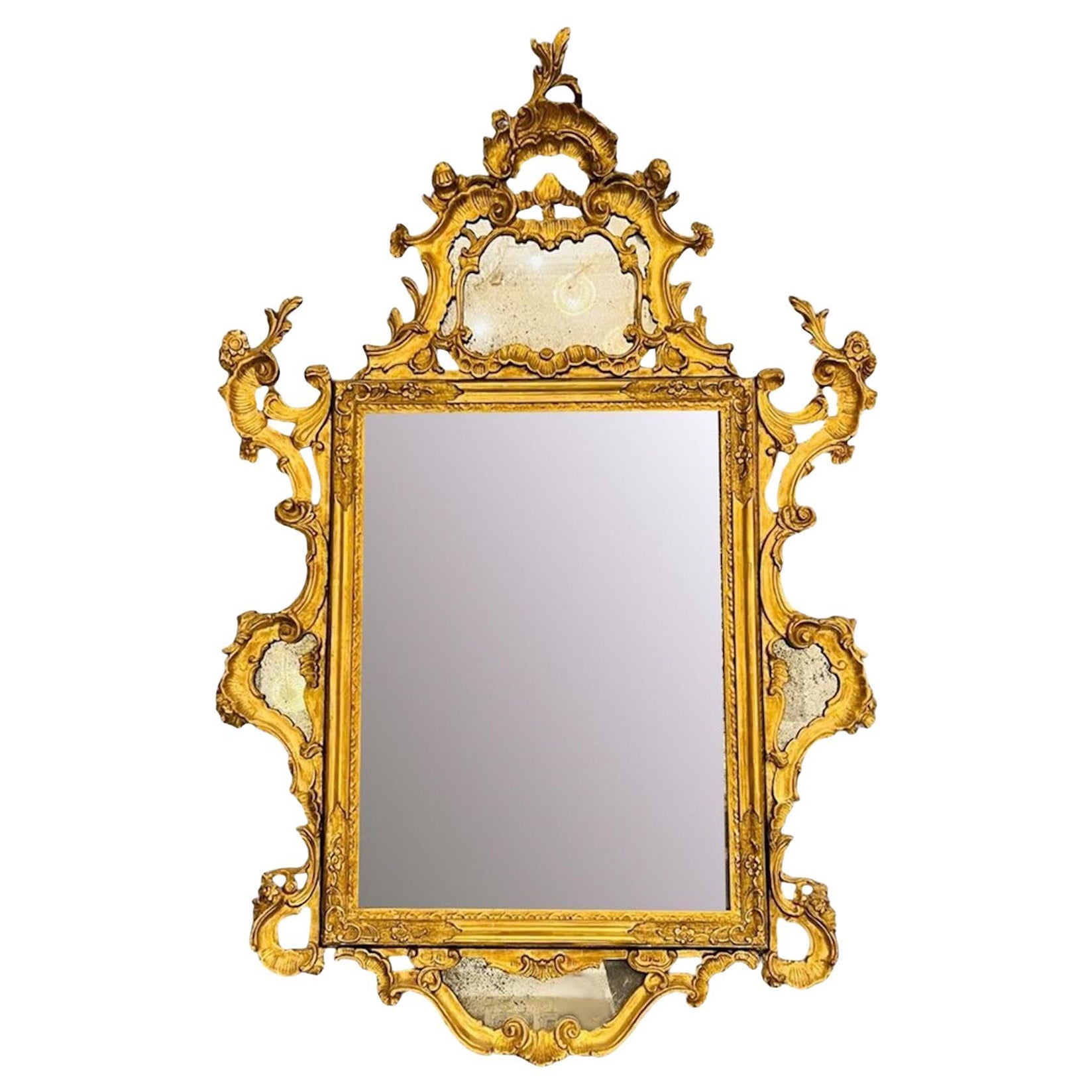 Miroir en bois sculpté et doré - Louis XV