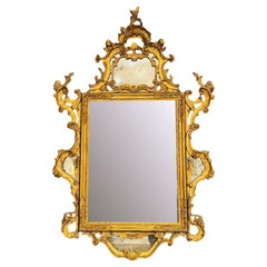 Miroir en bois sculpté et doré - Louis XV