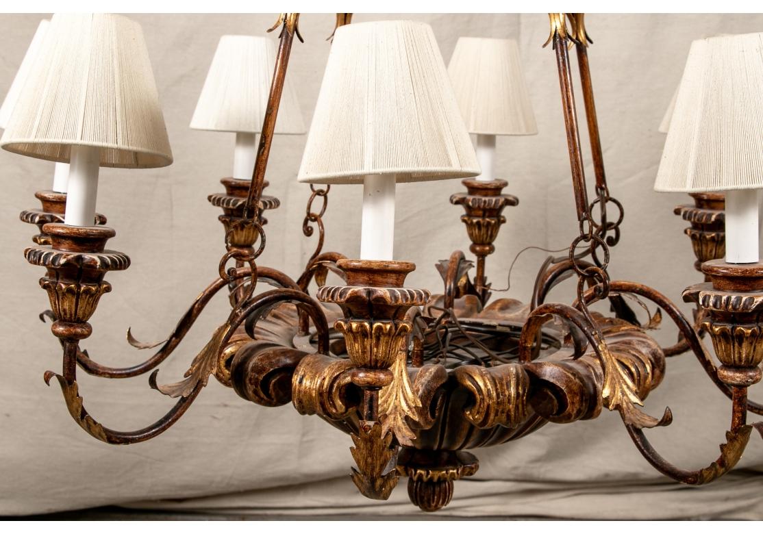 Hollywood Regency Carved And Gilt 8 Light Italian Made Chandelier in vendita