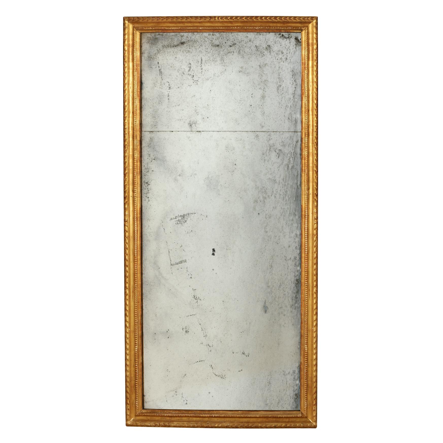 Carved and Gilt Pier Mirror With Antiqued Glass In Good Condition For Sale In Locust Valley, NY