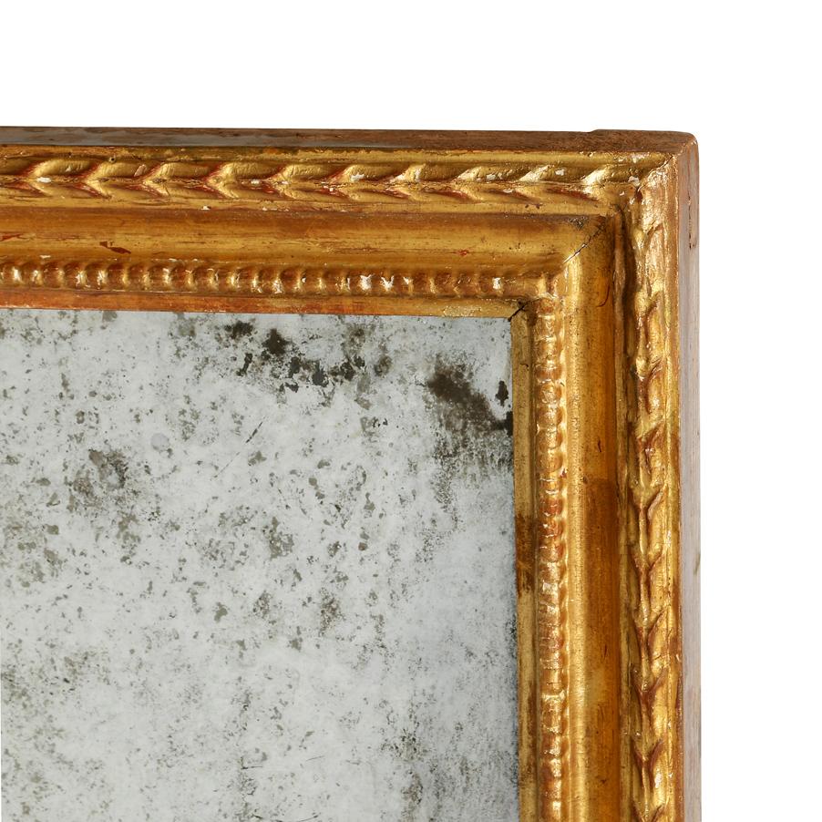 20th Century Carved and Gilt Pier Mirror With Antiqued Glass For Sale