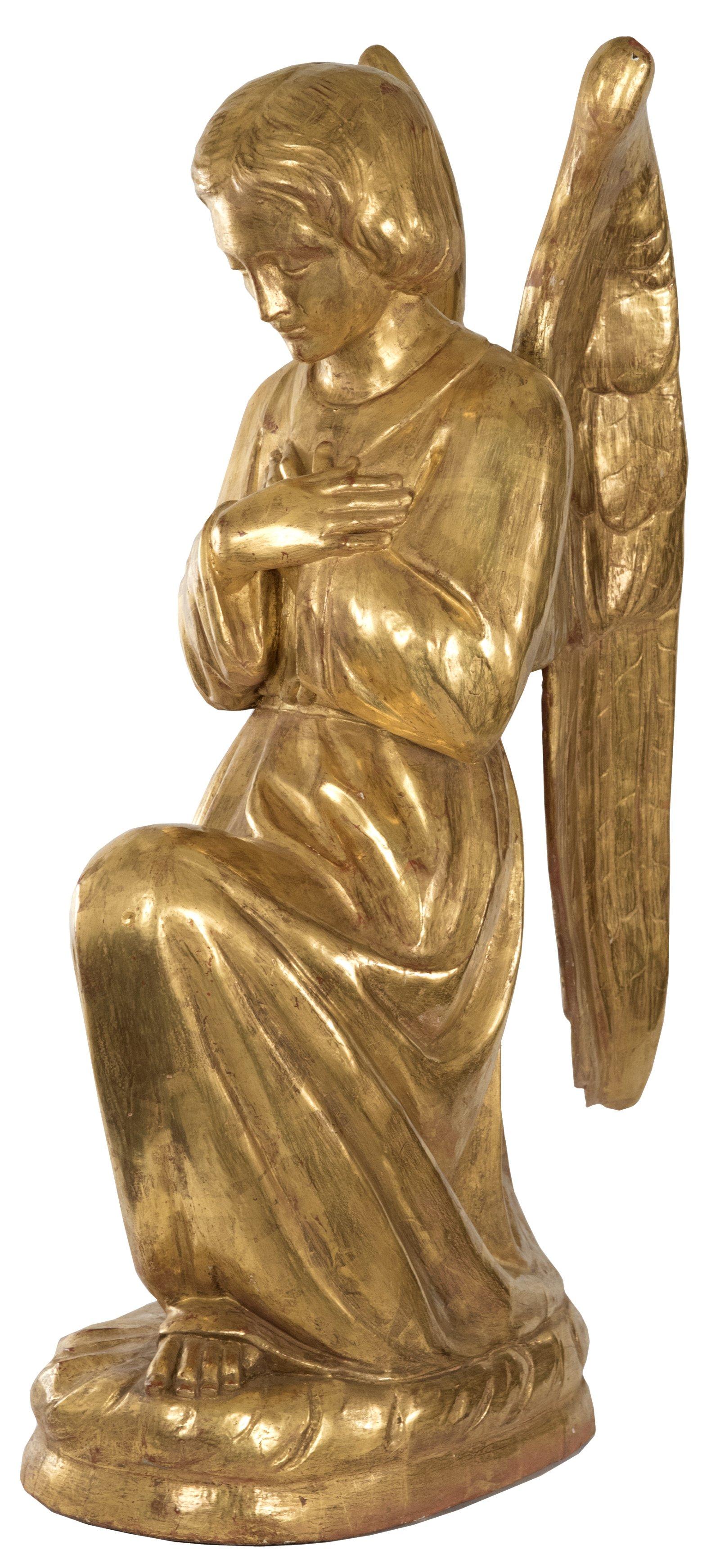 A French carved and giltwood angel on bended knee with hands clasped to their chest and head bowed in reverence as their wings are pulled gently to behind their back. The piece is uncomplicated and simply carved, and yet exudes a strong sense of