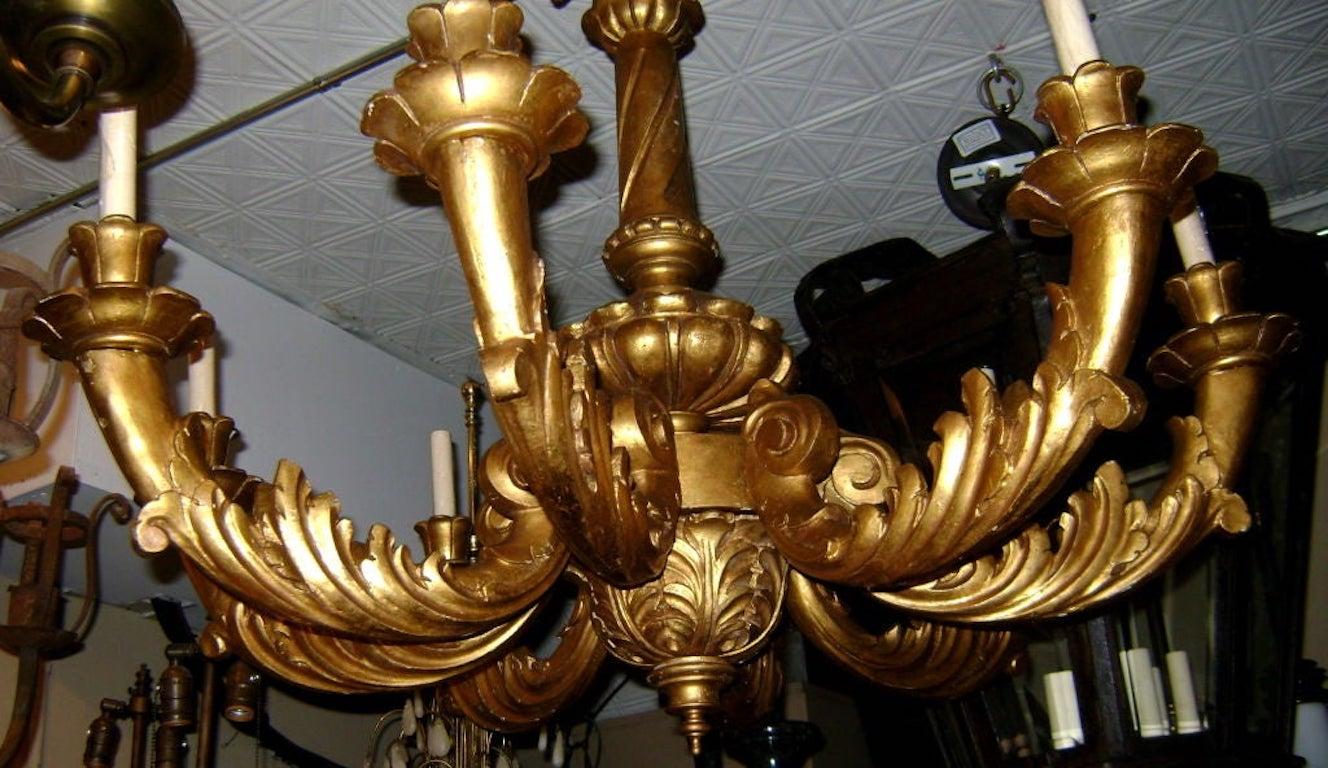 Italian Carved and Gilt Wood Chandelier For Sale