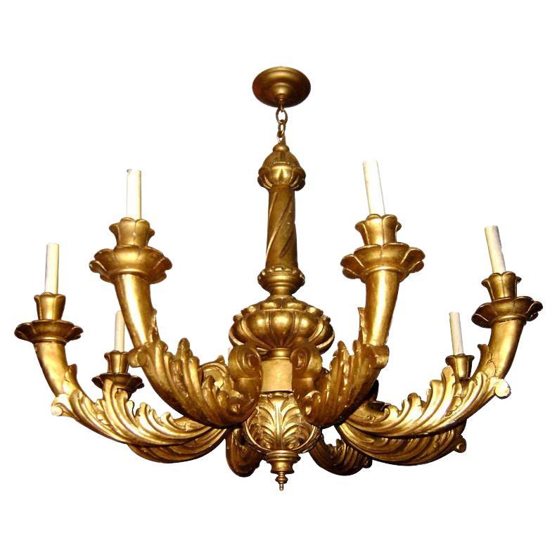 Carved and Gilt Wood Chandelier For Sale