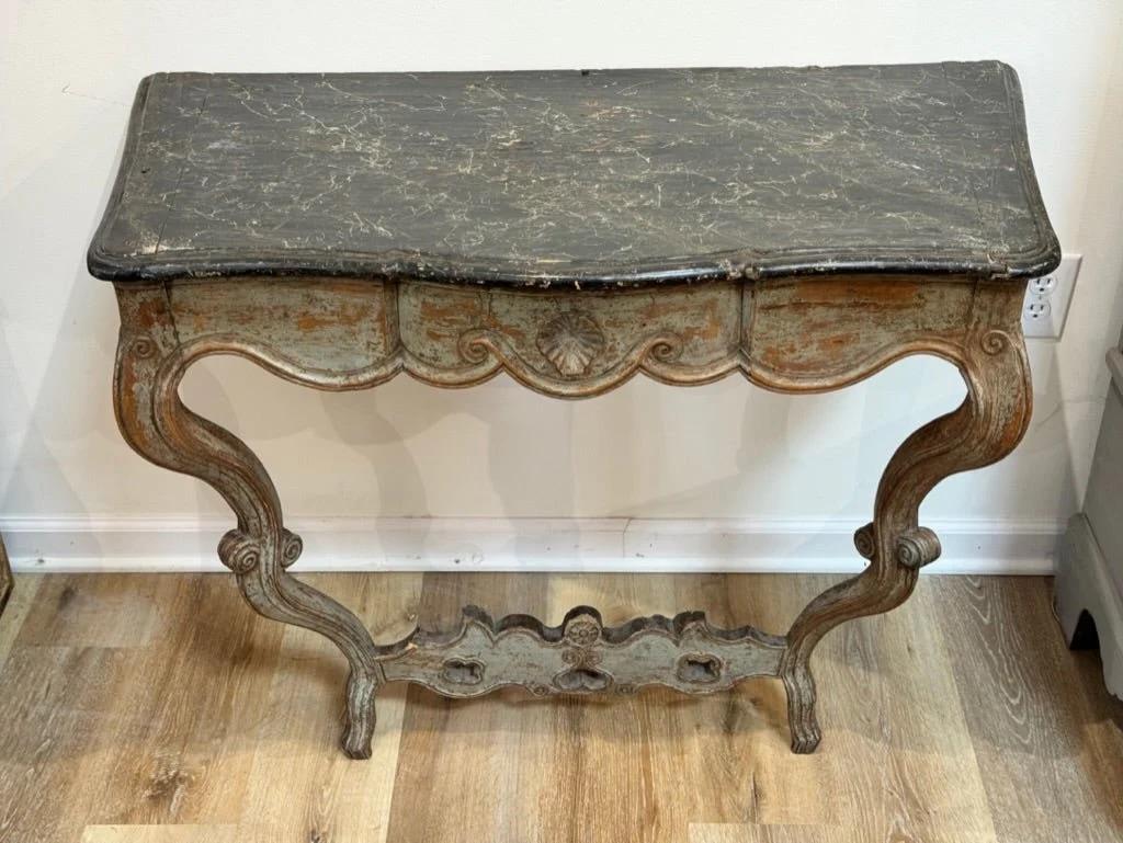 European Carved and painted French or Italian Console table with faux marble top