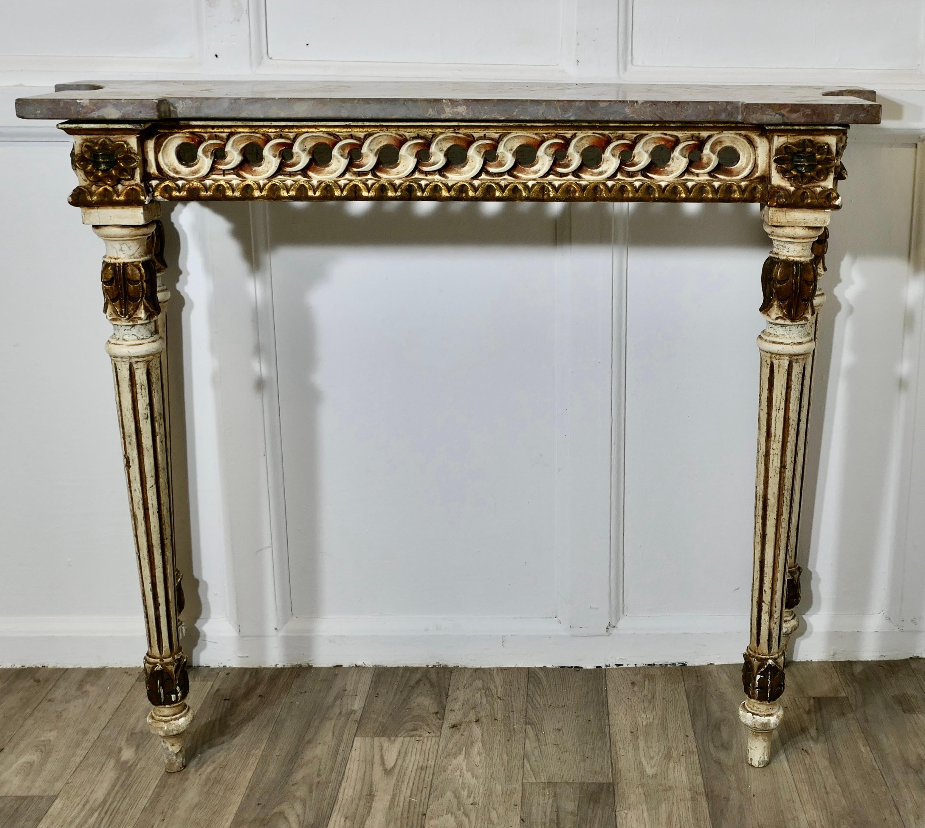 Carved and Painted French Style Console or Hall Table  

This is a very attractive piece it is carved in the French Provincial Louis Philippe style, the paint is original and in muted tones of Smoky Grey Green and Rose with touches if gilt which