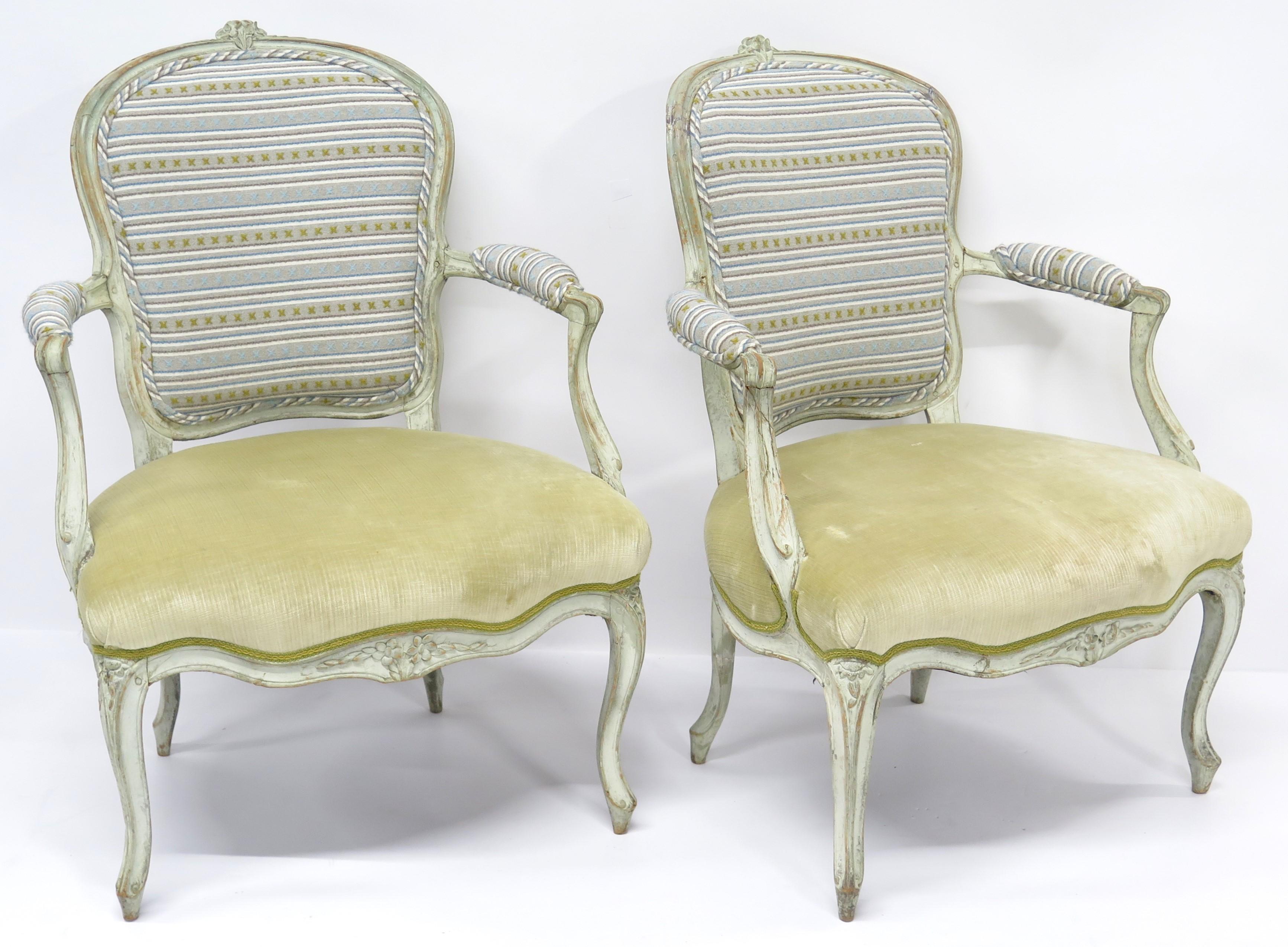 A nicely scaled pair carved and painted Louis XV Fauteuils  3rd quarter of the 18th Century. France. Circa 1760.

DIMENSIONS:

36