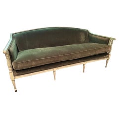 Carved and Painted Louis XVI Style Green Velvet Sofa