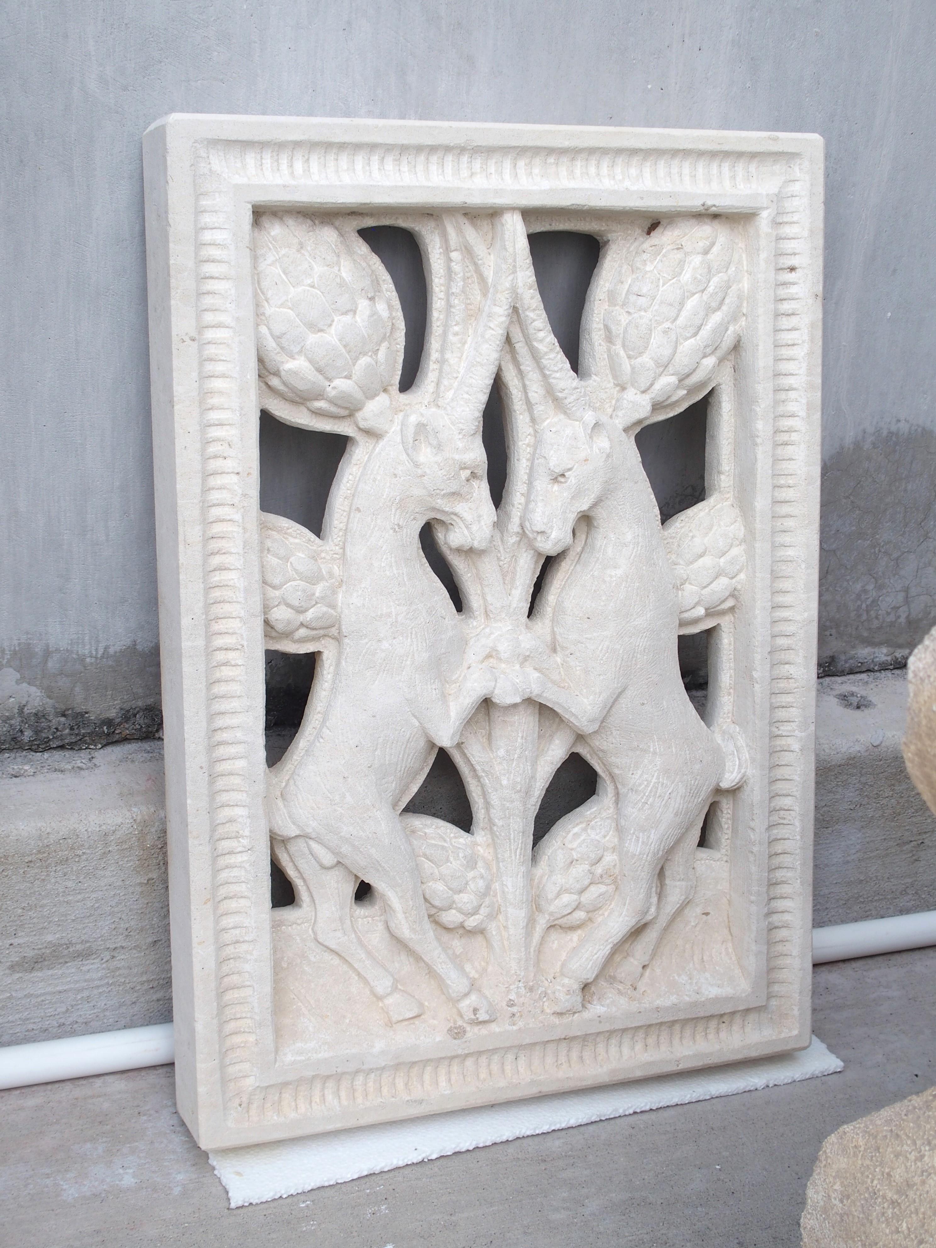 Hand-carved in Italy, this limestone plaque depicts a pair of rampant ibex in front of an expansive grapevine. This scene is most likely an interpretation of a sixth-century Sasanian (Persian) stucco plaque that can be seen in the Louvre.

The