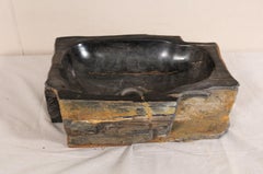 Carved and Polished Black and Warm Brown Petrified Wood Sink