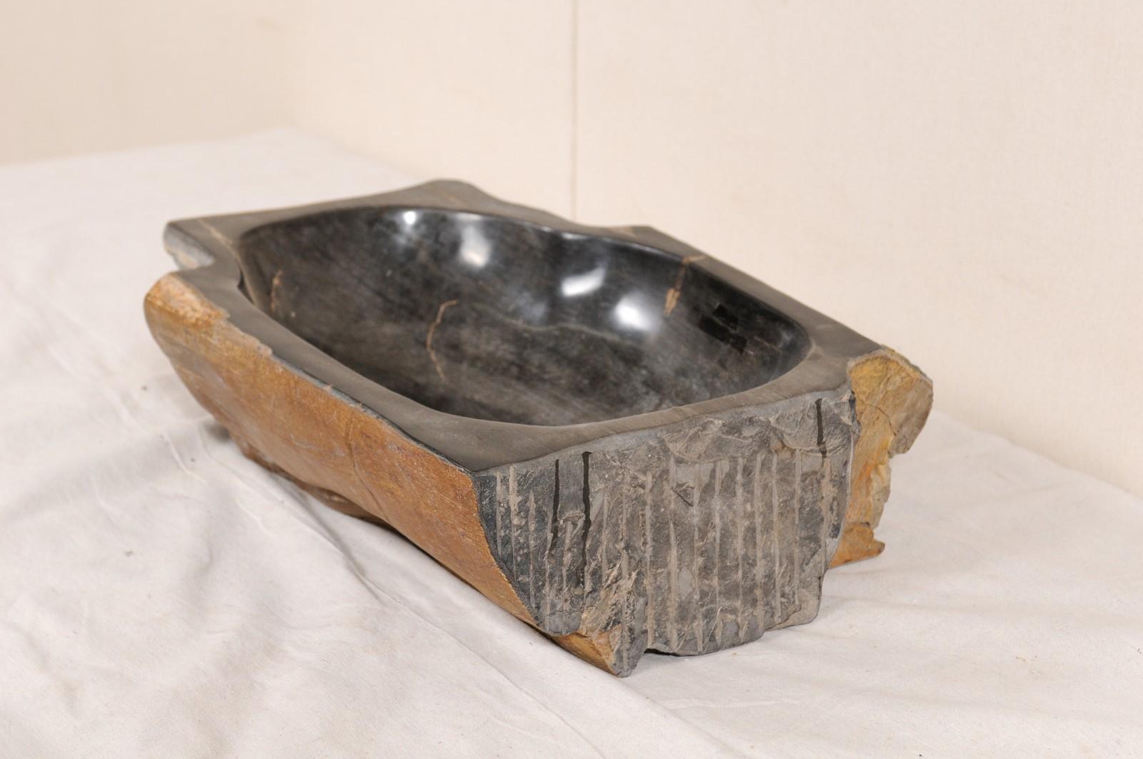 Contemporary Carved and Polished Black and Warm Brown Petrified Wood Sink