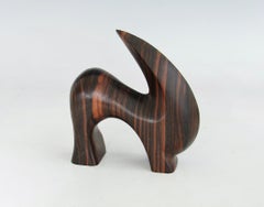 Carved and polished stylized rosewood desktop sculpture of ram or mountain goat