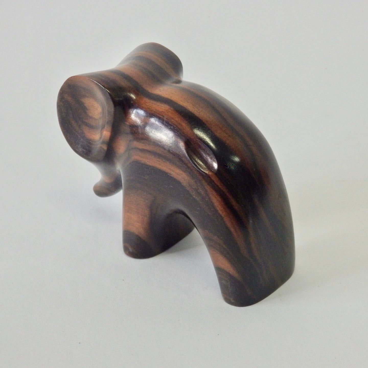 American Carved and Polished Stylized Rosewood Elephant Sculpture For Sale