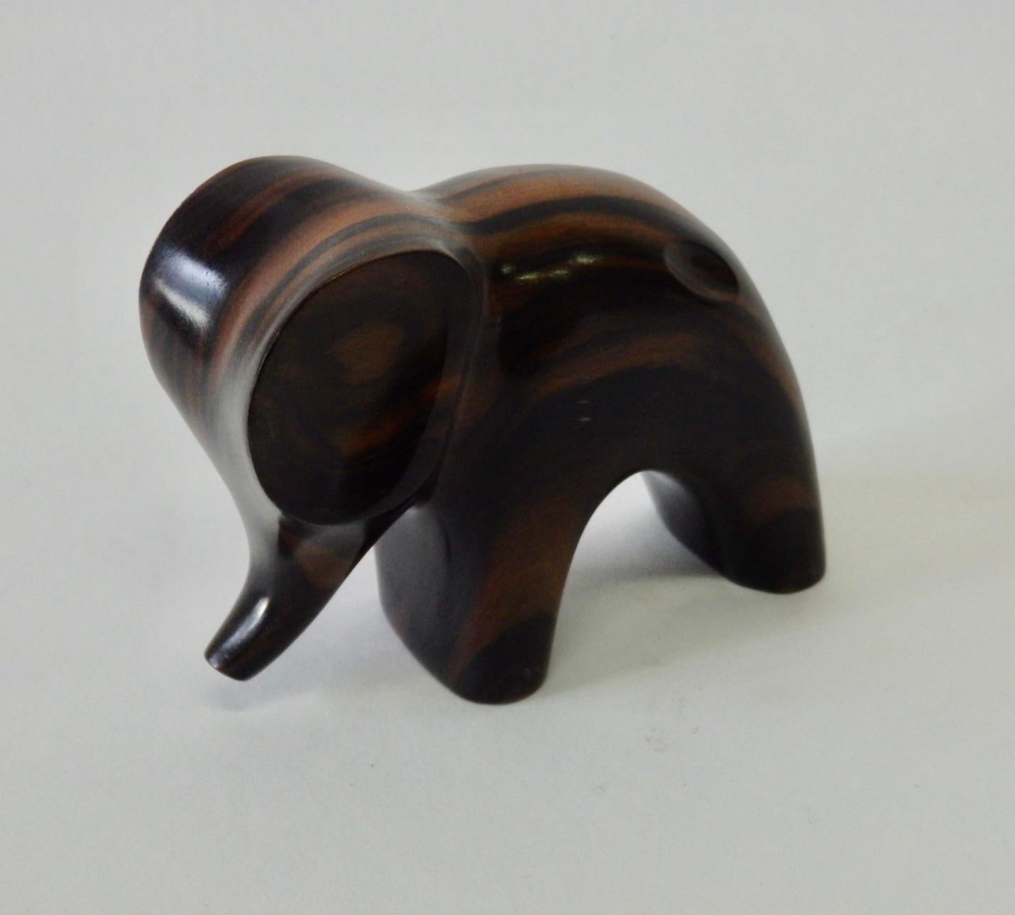 Hand-Carved Carved and Polished Stylized Rosewood Elephant Sculpture For Sale