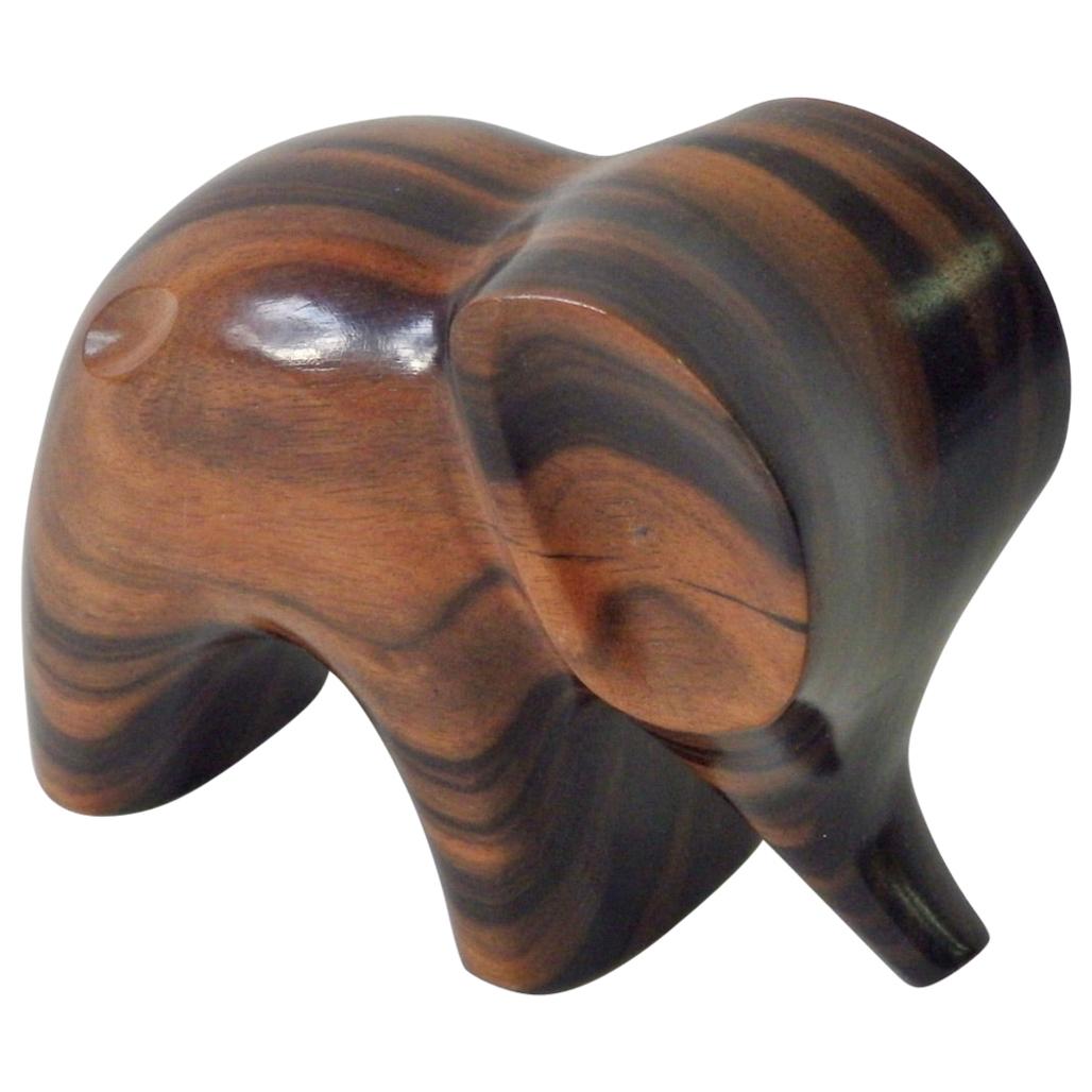 Carved and Polished Stylized Rosewood Elephant Sculpture For Sale