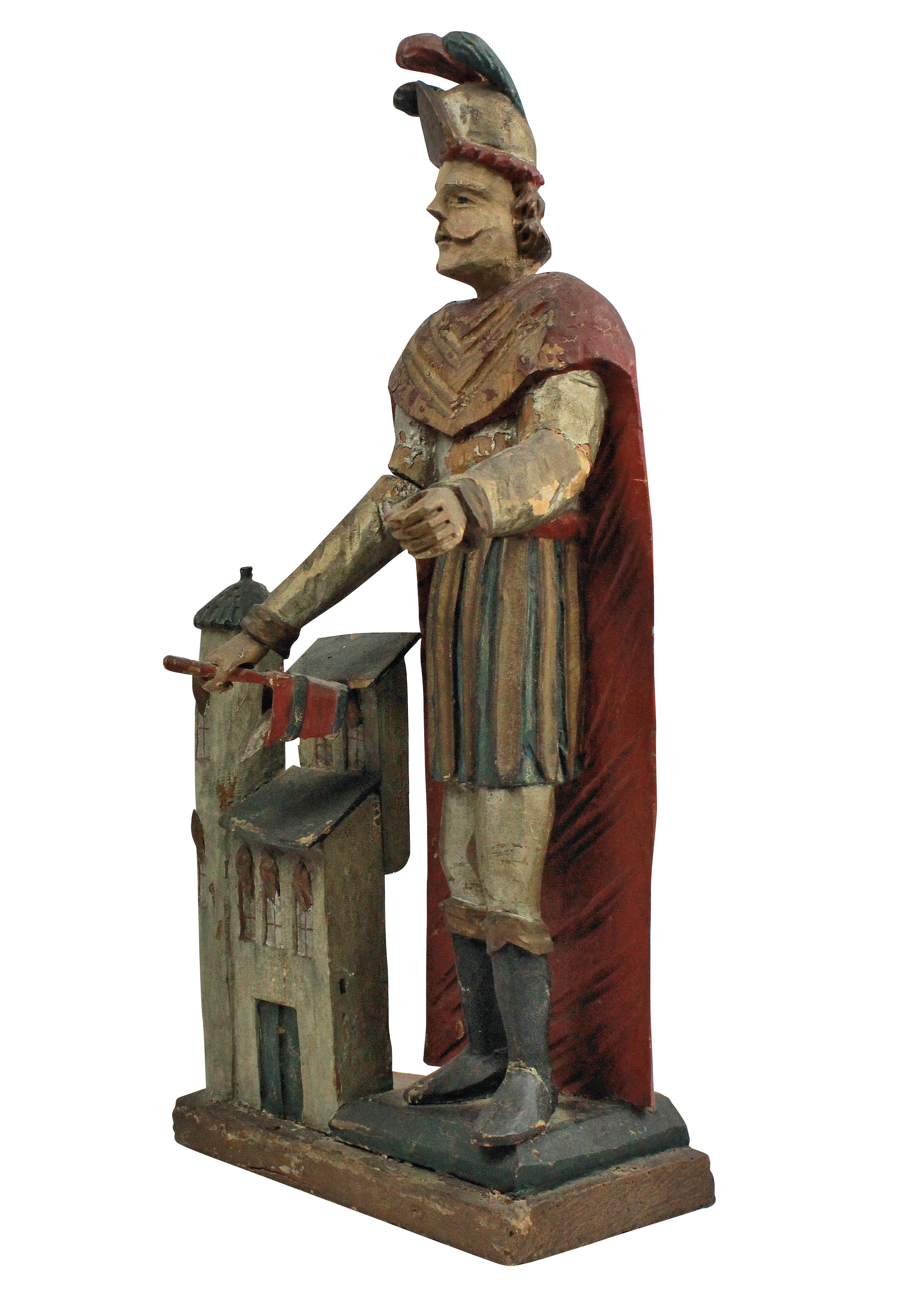 A French late 18th century statue of St Florian, in carved fruitwood with polychrome paints. Missing his spear.

The Patron Saint of Austria, chimney sweeps, fire fighters and brewers.