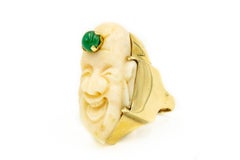 Carved Angel Skin Coral Smiling Buddha Face Gold Ring with Emerald Third Eye