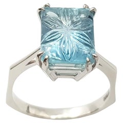 Bague aigue-marine sculptée sertie en platine 900