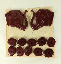 Carved Bakelite Art Deco Elephant Dress Suite