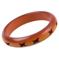 Bracelet jonc en bakélite sculptée couleur caramel ambré