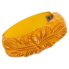 Carved Bakelite Bracelet Yellow Marigold and Floral Motif