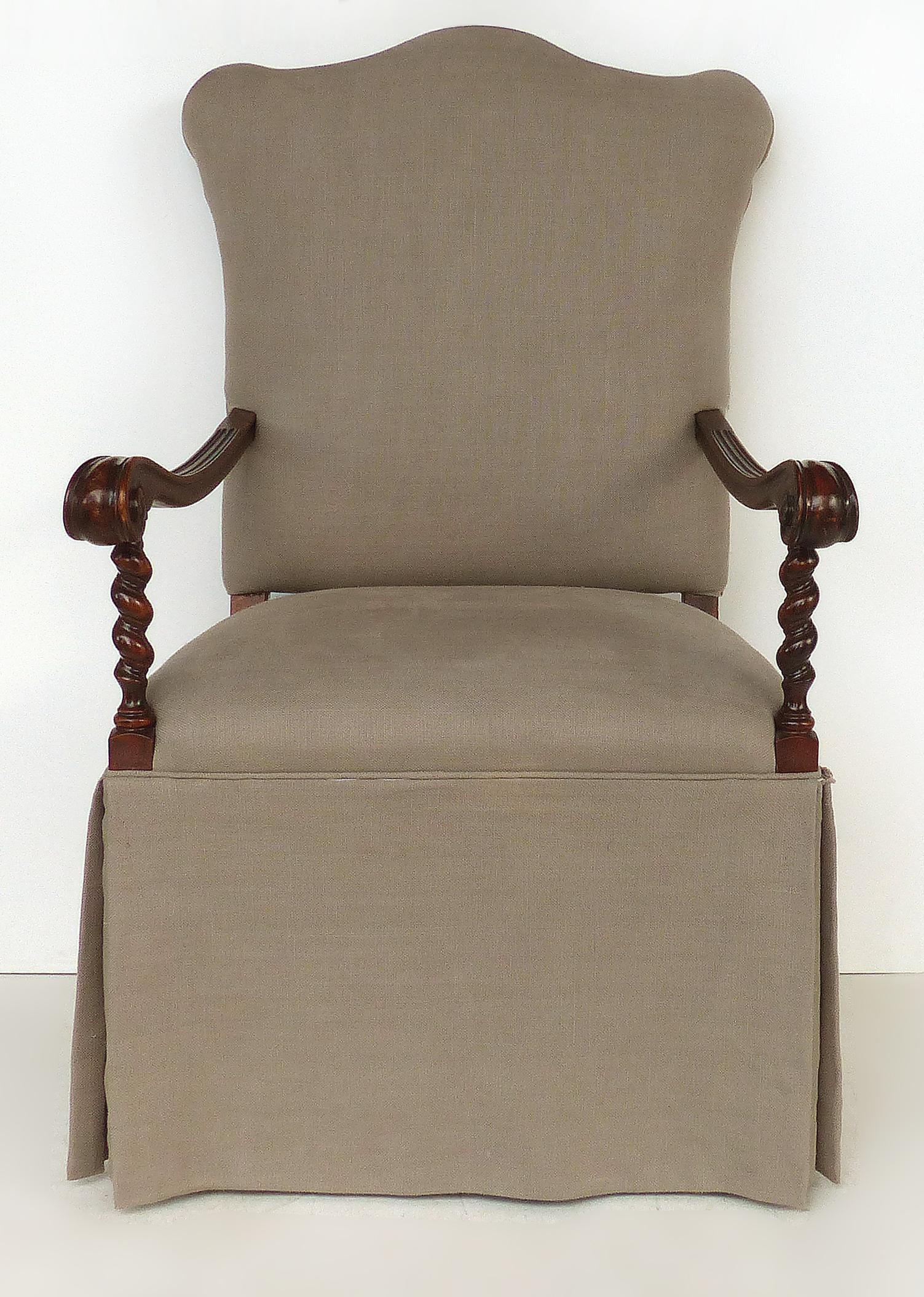 Carved barley twist armchair, upholstered seat and back

Offered for sale is an armchair with a carved turned barley twist frame. The carving is opposing or handed. The seat and back have been upholstered with a slipcovered look. There is some