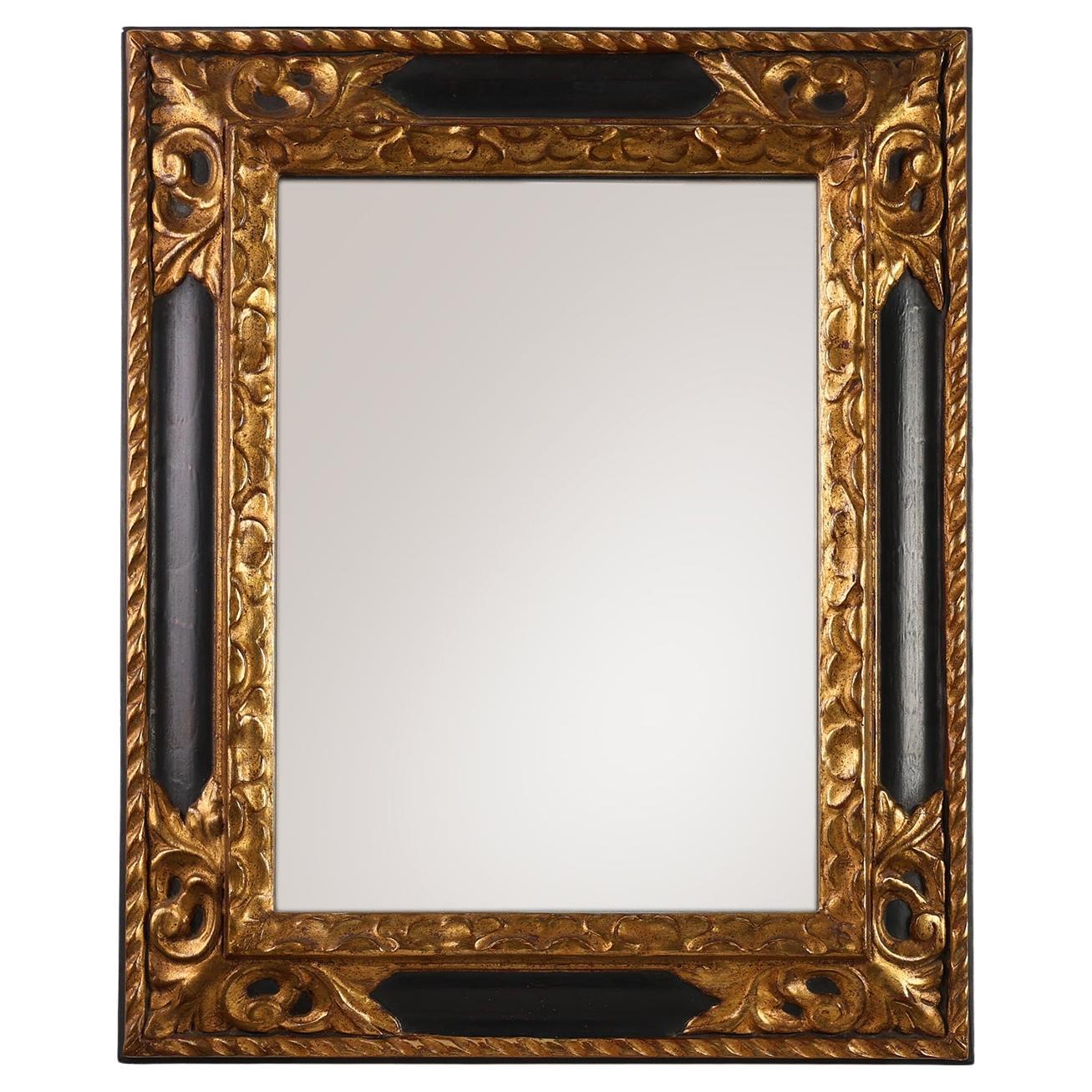 Miroir baroque sculpté en bois doré et noir, France, années 1850 en vente