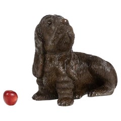 Antique Carved basswood dog, Black Forest style. Circa 1900.