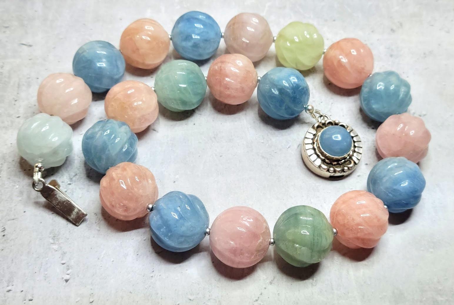 The length of the necklace is 18.5 inches (47 cm). The massive size of the rare carved beads is 18 mm.
The color of the beads is a soft shade of light green, light blue, pale peachy pink, and pale orange. Very gentle soft pastel colors! Huge