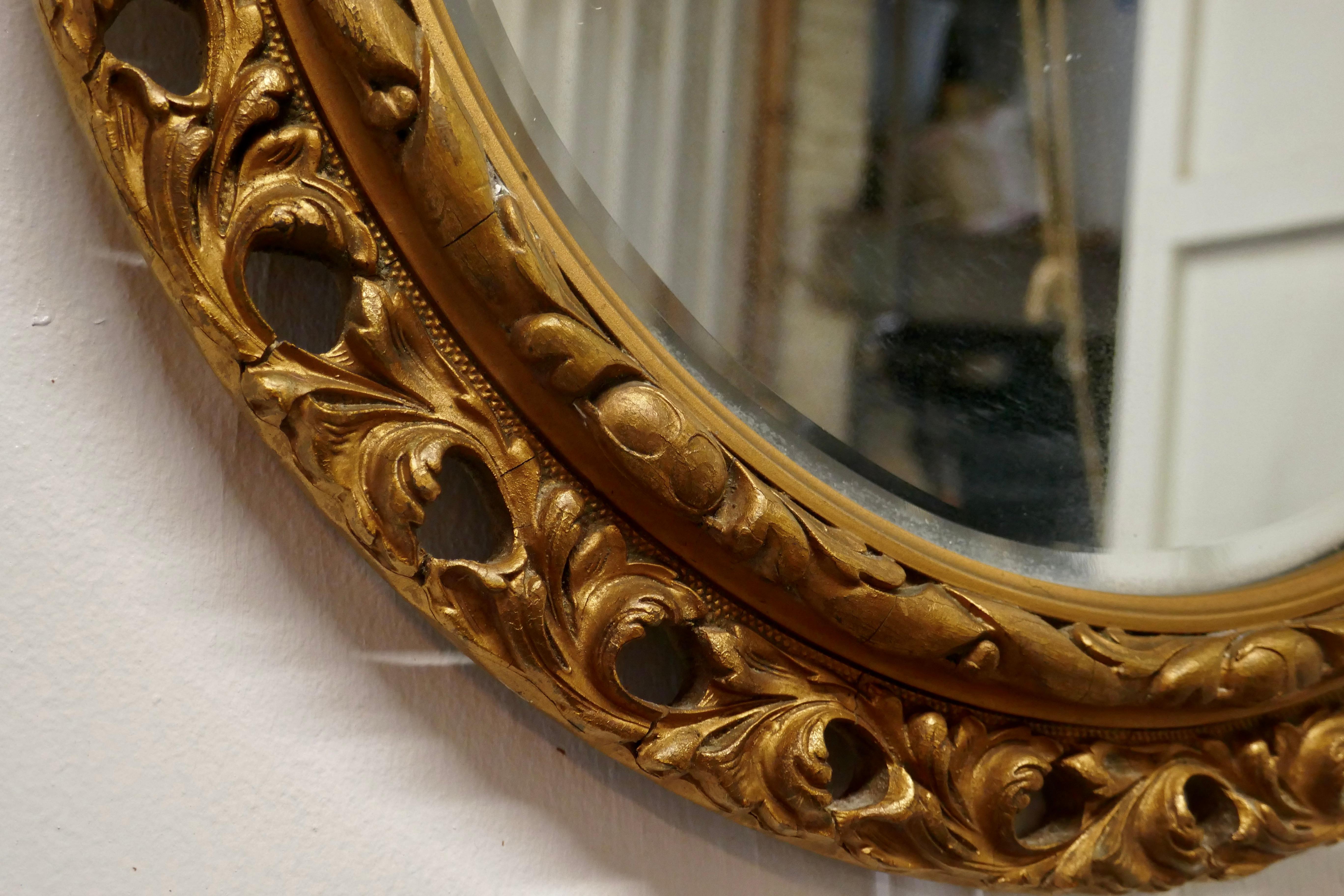Carved Bevelled Gilt Round Wall Mirror In Good Condition For Sale In Chillerton, Isle of Wight