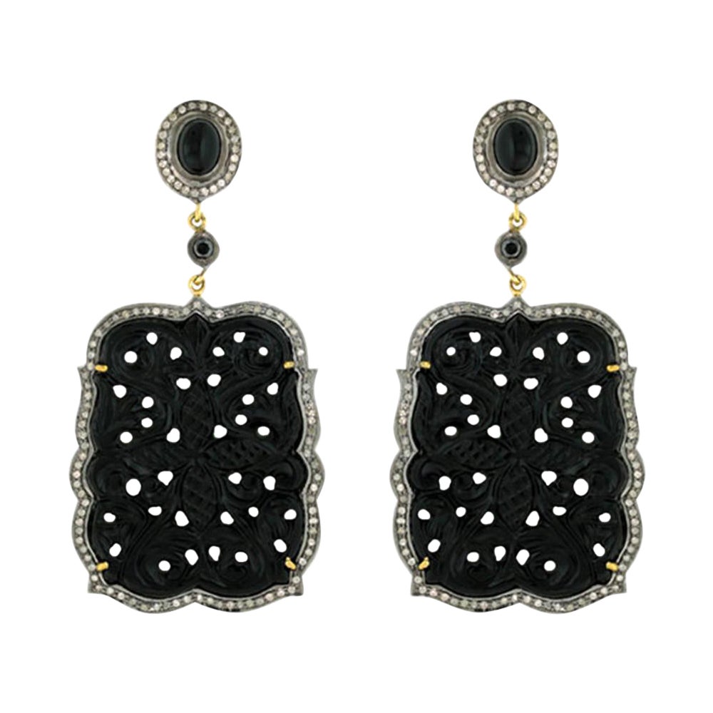Boucles d'oreilles en or 18 carats et argent avec onyx noir sculpté et diamants