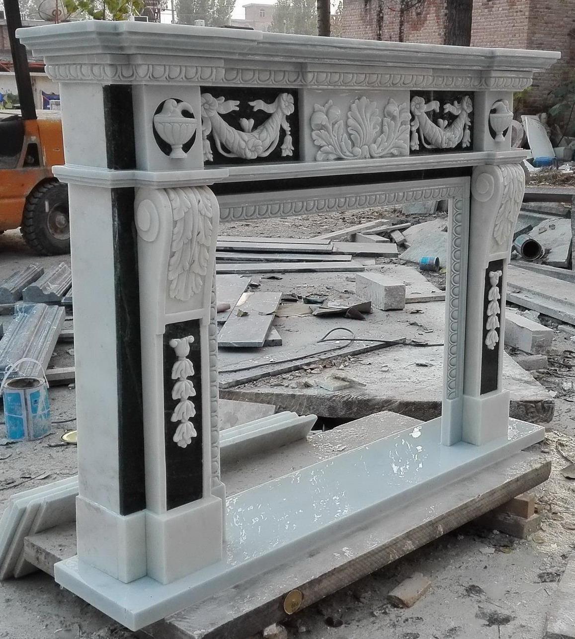 20th Century Carved Black and White Marble Fireplace Surround For Sale